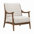 Fauteuil en tissu bouclé avec cadre en bois de noyer