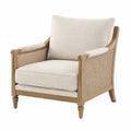 Fauteuil en bois chêne et rotin avec coussins en lin beige